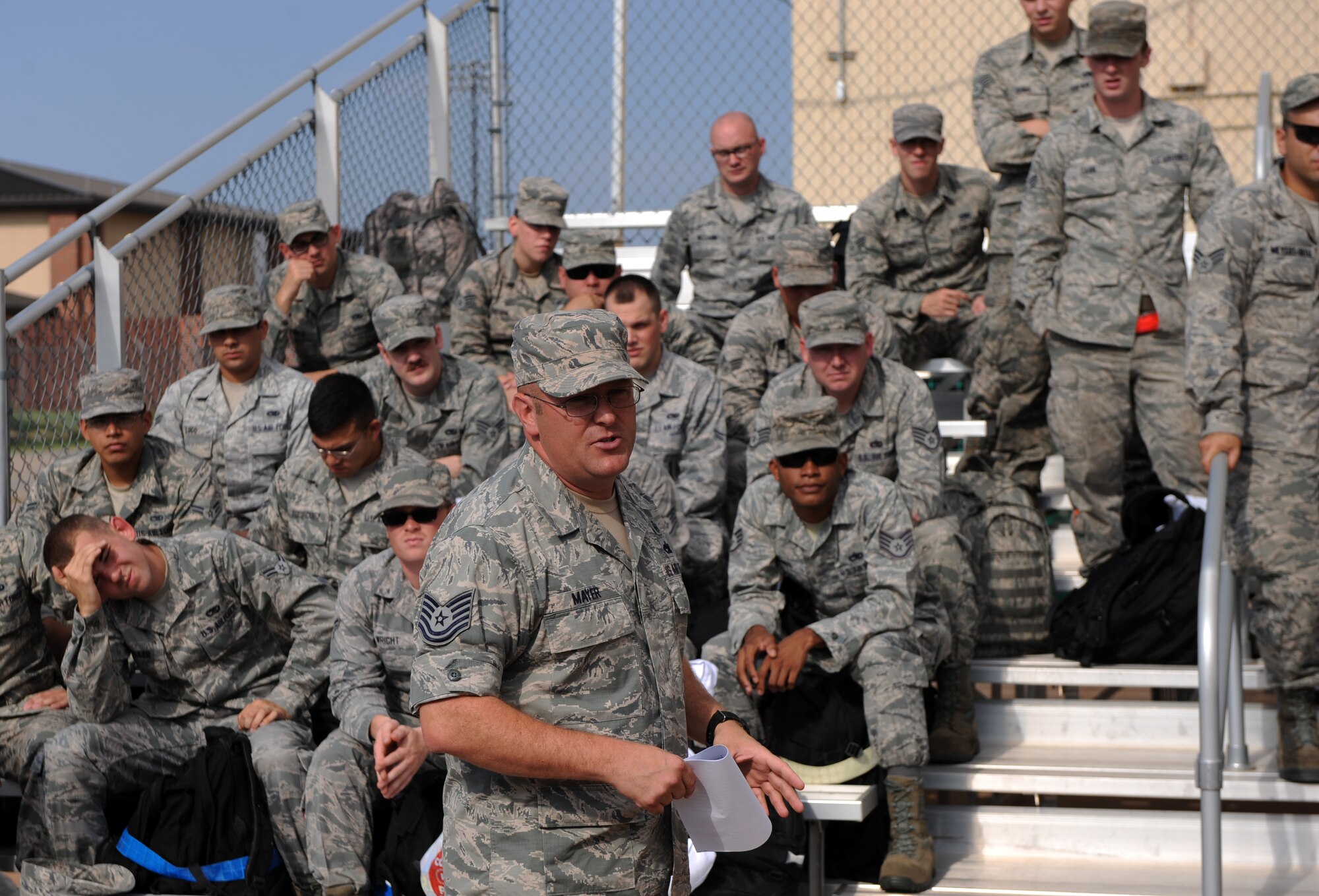 U.S. Air Force Tech. Sgt. Bryan Mayer, 7th Bomb Wing plans and programs office, gives Airmen an Operational Security (OPSEC) briefing July 29, 2014, at Dyess Air Force Base, Texas. OPSEC is the protection of operational information and is crucial to a safe and successful deployment. More than 350 Dyess personnel recently deployed to Al Udeid Air Base, Qatar. (U.S. Air Force photo by Airman 1st Class Alexander Guerrero/Released)