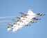 The U.S. Air Force Thunderbirds perform the Echelon Pass In Review during Arctic Thunder 2014 here July 26. The F-16s are assigned to the U.S. Air Force Air Demonstration Squadron at Nellis Air Force Base, Nev. (U.S. Air Force photo by Tech. Sgt. Dana Rosso)