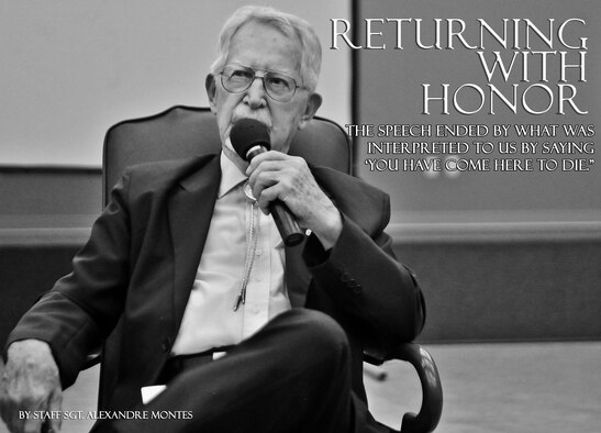 James J. Bollich speaks to audience members in the 336th training Group auditorium about his time as a prisoner of war at Fairchild Air Force Base, Washington, June 26, 2014. Bollich was a prisoner of war during World War II and a survivor of the Bataan Death March. Members of Fairchild listened to Bollich speak about how Survival, Evasion, Resistance and Escape training saved his life and the importance of their training. (U.S. Air Force illustration by Staff Sgt. Alexandre Montes/Released)