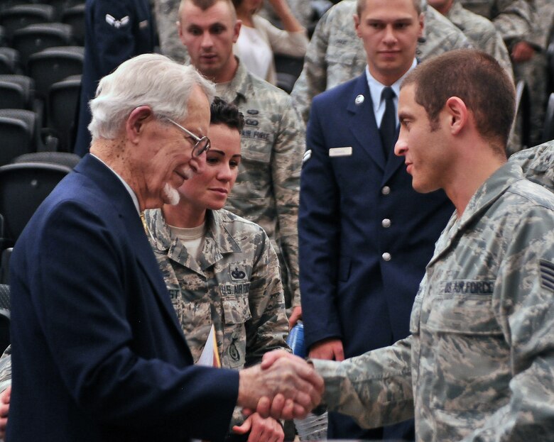 James J. Bollich thanks the audience members after his speech at Fairchild Air Force Base, Washington, June 26, 2014. Bollich was a prisoner of war during World War II and a survivor of the Bataan Death March. (U.S. Air Force photo by Staff Sgt. Alexandre Montes)