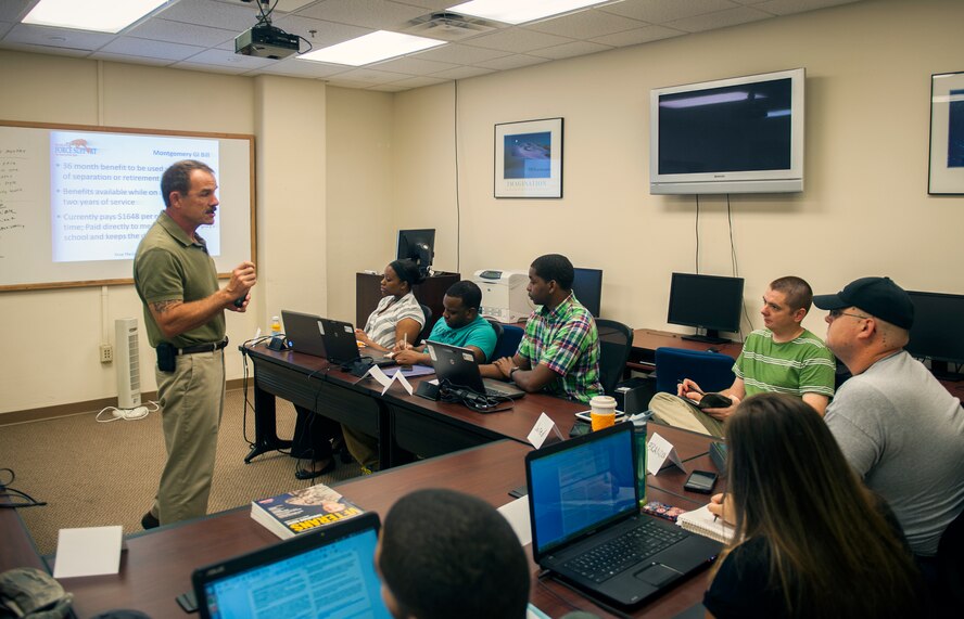 Darryl Gagne, 23d Force Support Squadron education specialist, talks about the Montgomery GI Bill during an education career path workshop July 23, 2014, at Moody Air Force Base, Ga. The two-day education workshop is an optional class that gives separating service members the basics of how to pick and enroll in school, and how to pay for school using the GI Bill, federal student aid and scholarships. (U.S. Air Force photo by Senior Airman Jarrod Grammel/Released)
