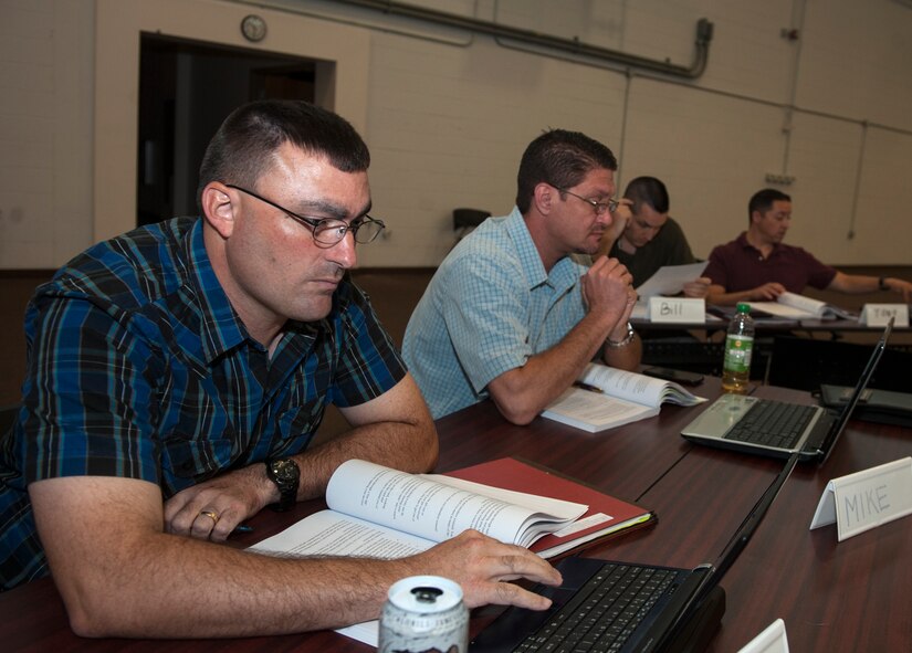 U.S. Air Force Master Sgt. Shane Saddler, 23d Equipment Maintenance Squadron, participates in a Transition Assistance Program (TAP) workshop July 23, 2014, at Moody Air Force Base, Ga. During the second segment of TAP, a representative from the Department of Labor instructs an employment seminar. (U.S. Air Force photo by Senior Airman Jarrod Grammel/Released)

