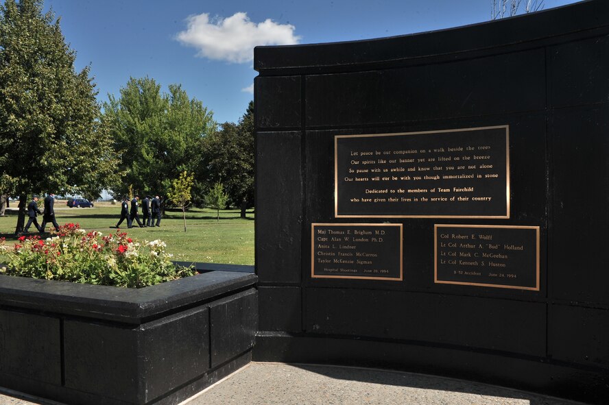 Col. Brian M. Newberry and Chief MSgt. Wendy Hansen give Lt. Gen. Carlton Everhart and Chief MSgt. Robert Rodewald a tour of the memorial park during the 18th Air Force command visit at Fairchild Air Force Base, Washington, July 25, 2014. Everhart is the 18th Air Force commander and Rodewald is the 18th Air Force Command CMSgt. (U.S. Air Force photo by Staff Sgt. Alexandre Montes)