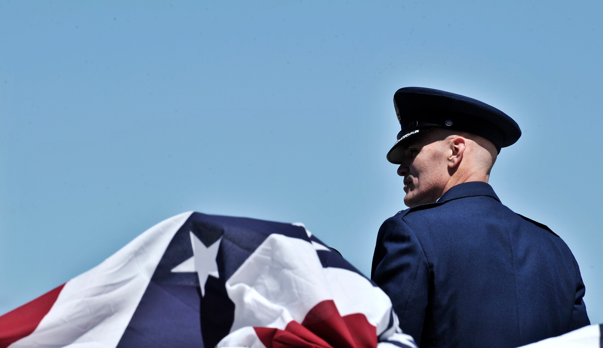 Lt. Gen. Carlton Everhart gives his opening remarks during the 92nd Air refueling wing Change of command at Fairchild Air Force Base, Washington, July 25, 2014. The change of command ceremony is a tradition that represents a formal transfer of authority and responsibility. Everhart is the 18th Air Force commander. (U.S. Air Force photo by Staff Sgt. Alexandre Montes/Released)