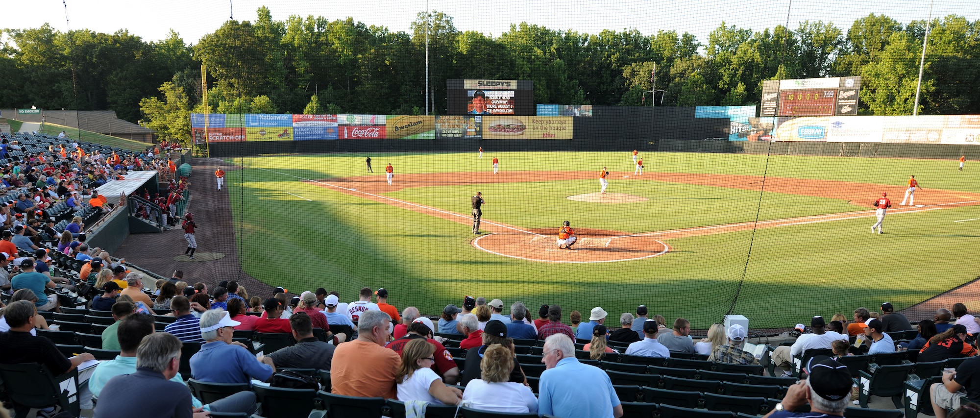Spectators watch as the Bowie Baysox warm-up in the third inning during Joint Base Andrews’ appreciation night at Prince George’s Stadium in Bowie, Md., July 25, 2014. The Baysox are currently ranked third in their division. (U.S. Air Force photo/Airman 1st Class Ryan J. Sonnier)