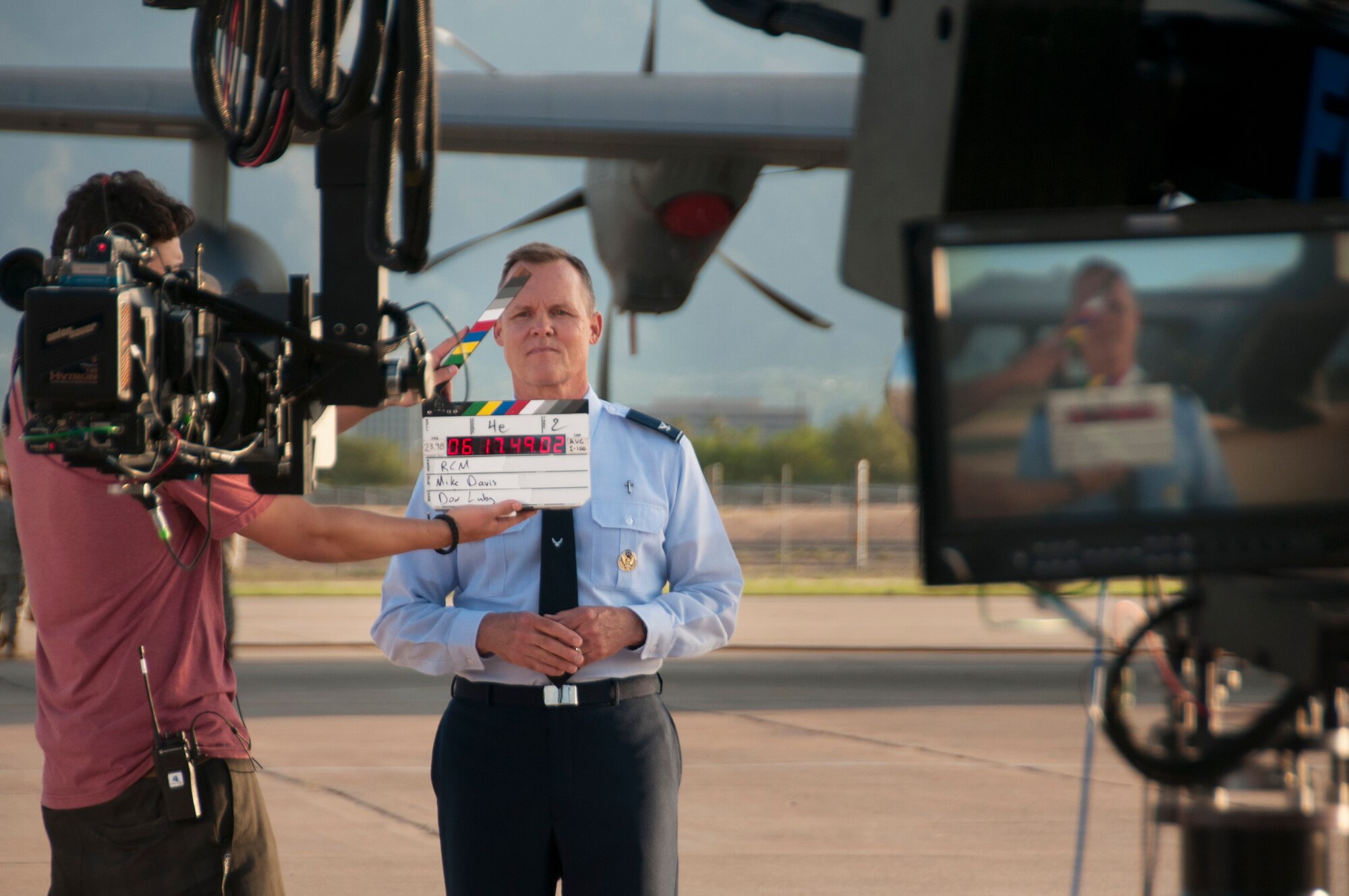 Chaplain Col. William T. Yates, deputy director of the Air National Guard Chaplain Corps, prepares for filming by the Air National Guard Recruiting Creative Marketing team at Davis-Monthan Air Force Base July 16, 2014. The team is filming a chaplain recruiting advertisement for the Air National Guard. (U.S. Air National Guard photo by Staff Sgt. Heather Davis/Released)