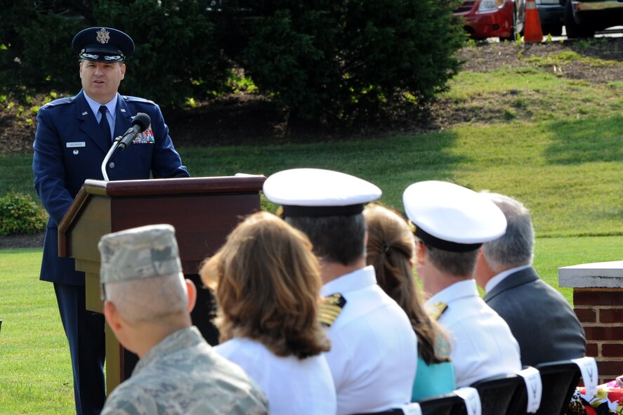 Col. Chris Patterson provides remarks during the Air Force Element change of command ceremony on the Joint Base Anacostia-Bolling Ceremonial Lawn in Washington July 29, 2014. Patterson is the Air Force District of Washington vice commander. The AFDW provides the Air Force voice and component to the Joint Forces Headquarters-National Capital Region. (U.S. Air Force photo/Master Sgt. Tammie Moore)