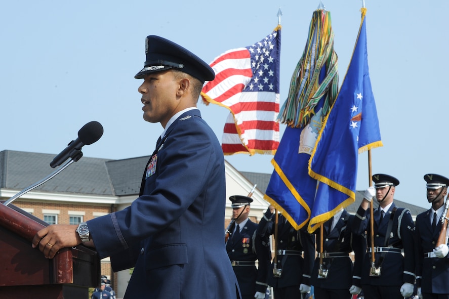 Col. Michael Saunders provides remarks during the Air Force Element change of command ceremony on the Joint Base Anacostia-Bolling Ceremonial Lawn in Washington July 29, 2014. Saunders served as the JBAB Air Force Element commander since 2012. The Air Force Element at JBAB provides joint installation support to more than 16,000 military and civilian employees and their families throughout the National Capital Region. (U.S. Air Force photo/Master Sgt. Tammie Moore)