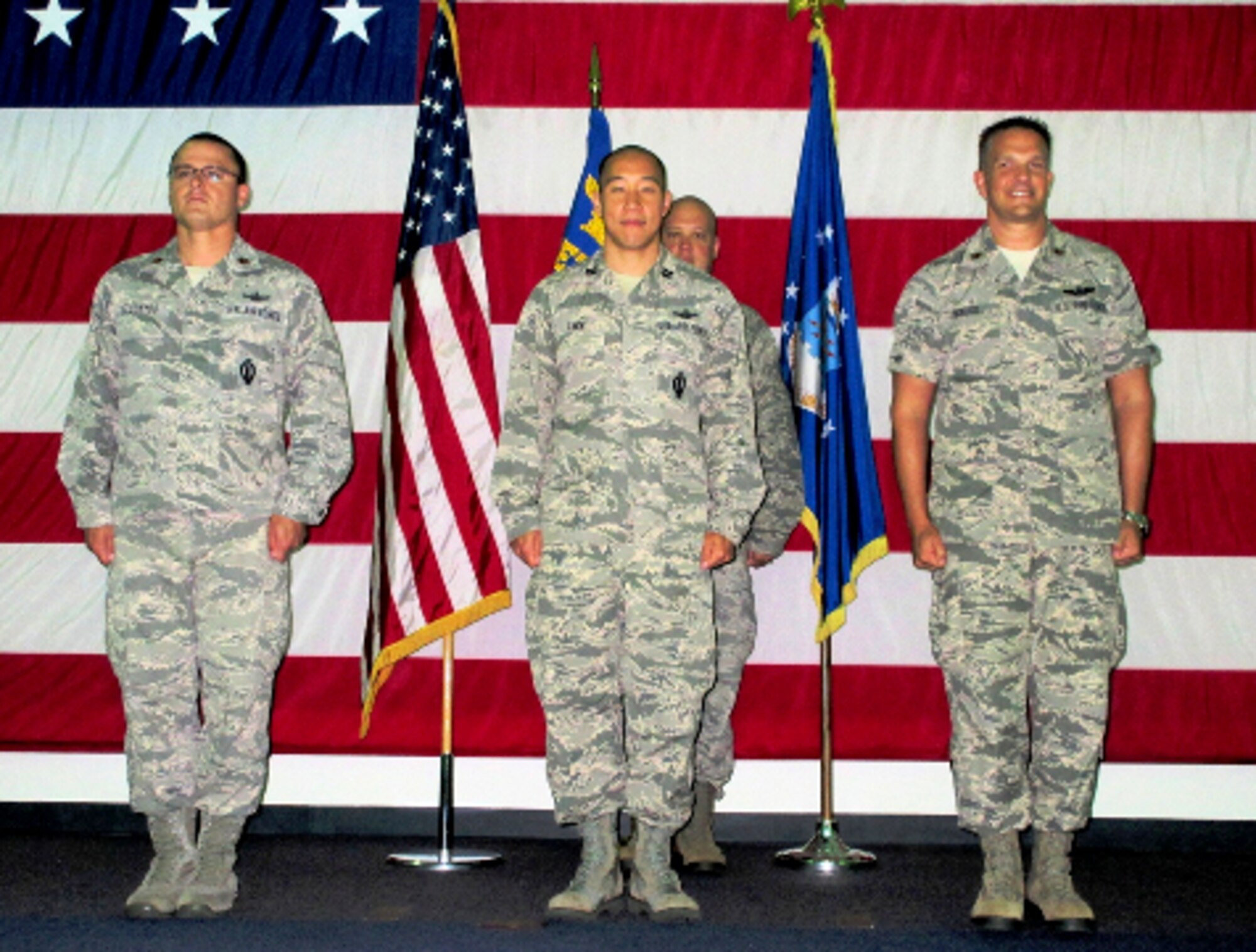 DIEGO GARCIA, BRITISH INDIAN OCEAN TERRITORY – Capt. John Paek (center) assumes command of 21st Operations Group, Detachment 2 , from Maj. Timothy Blockyou (left) here May 12. Maj. Mark Skalko, 730th Air Mobility Squadron, Detachment 1 commander (right) was the presiding official. Det. 2 is one of three geographically separated Ground Based Electro Optical Deep Space Surveillance units tasked to provide space situational awareness to the United States and allies. As the only GEODSS site in the southern hemisphere, Det. 2 tracks more than 9,000 objects daily and is responsible for more than 55 percent of all deep space tracking. (U.S. Air Force photo)