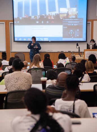 Space and Naval Warfare Systems Center Atlantic Commanding Officer Navy Capt. Amy Burin, talks to students and parents about Science, Technology, Engineering and Mathematics, July 26, 2014, at Girls Day Out Summer Camp at the College of Charleston. Girls Day Out Summer Camp inspires, attracts and empowers rising 8th and 9th grade girls to pursue STEM majors and careers. (U.S. Navy photo/Joe Bullinger)