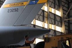 JOINT BASE CHARLESTON, S.C. – Chief Master Sgt. Mark Bronson, 628th Air Base Wing command chief, arrives in style atop a Light Medium Tactical Vehicle during the 2014 Triple Pack Combat Dining Out ceremony July 26, 2014, at Joint Base Charleston, S.C. The Dining Out custom is rooted in military history and tradition, and affords service members the chance to bond over food, drink and activities. The “Combat” element of the Dining Out added an informal twist and involved costumes, an obstacle course and a water fight. (U.S. Air Force photo/1st Lt. Christopher Love)