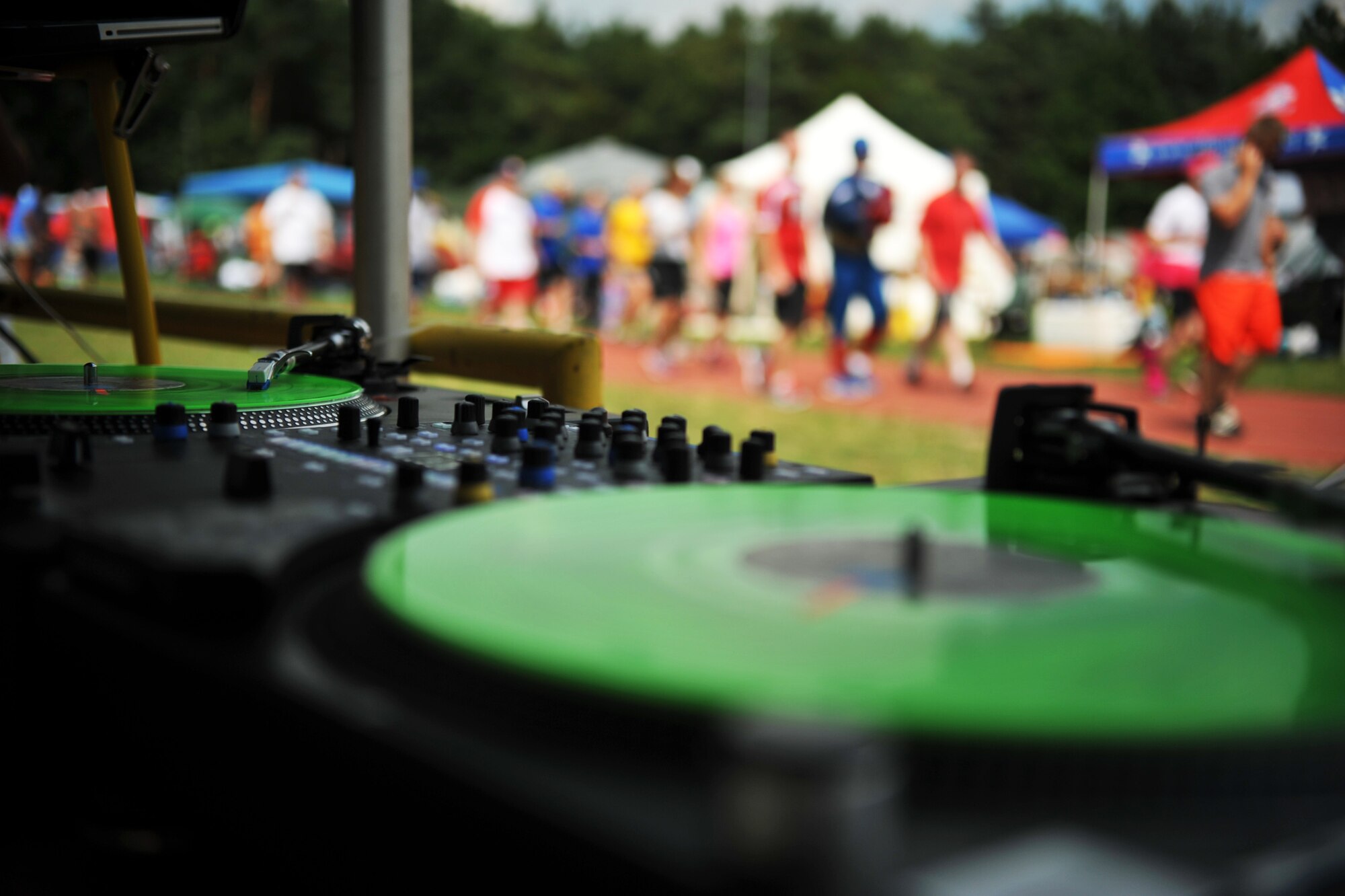 Tech. Sgt. Dennis Moore, 86th Aircraft Maintenance Squadron crew chief, DJ’s the 2014 Viking Challenge, July 25, 2014 at the Pulaski Park Track. The fundraising event brought in more than 1,500 participants. (U.S. Air Force photo/Senior Airman Hailey Haux)