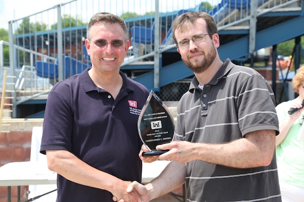 Chris Dening received the Great Lakes and Ohio River Division (LRD) Hard Hat of the Year award from District Commander Bernard Lindstrom, June 27.