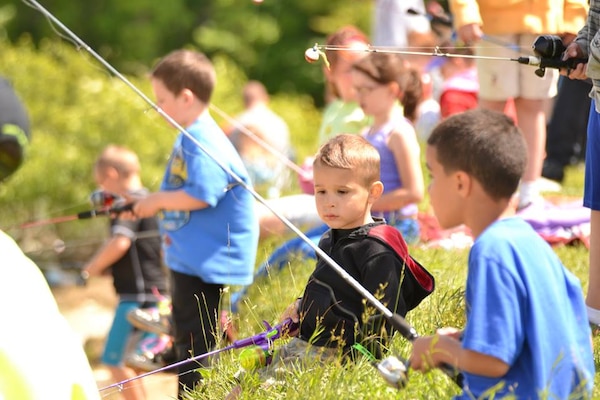 It all started with a simple idea of a local police chief wanting to take kids fishing. Soon after, it became clear that “Cops and Bobbers” was going to be much more than that. 
On June 14, nearly 2000 people including more than 765 kids stormed the shores of Michael J. Kirwan Reservoir with a free fishing rod in one hand and donated bait in the other. 