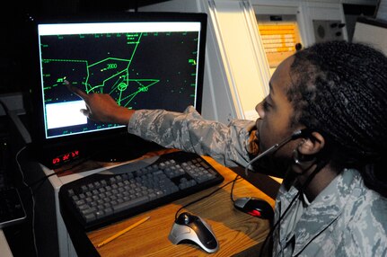 Airman 1st Class Leah Ned, a member of the Louisiana Air National Guard, points to a mark that represents the location of an aircraft on a simulated radar control screen at the Air Traffic Control Tower at Selfridge Air National Guard Base, Mich., Jan. 8, 2012. Selfridge is one of several locations in the Air National Guard where air traffic control trainees receive the hands-on portion of their training to become certified as controllers by the Federal Aviation Administration.