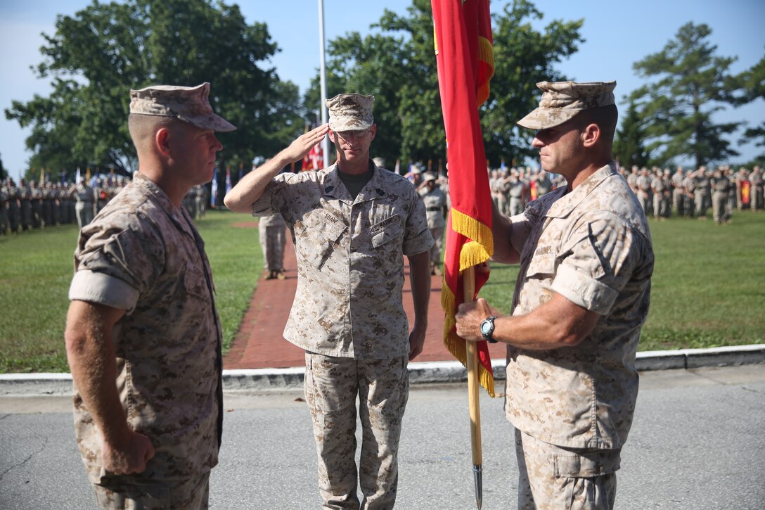Col. James B. Stopa relinquished command of the 2nd Marine Headquarters Group to Col. Thomas J. Gordon during a change of command ceremony at Building H1 aboard Marine Corps Base Camp Lejeune, N.C., June 26.