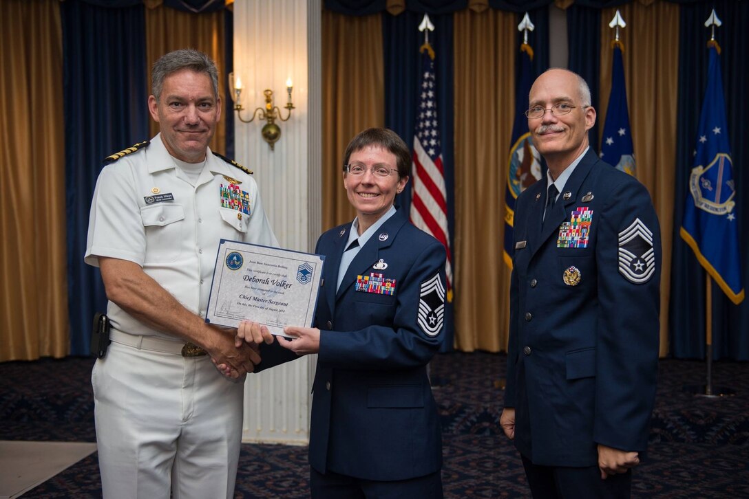 Congratulations to our newest Chief Master Sergeant! CMSgt Deborah Volker pinned on her new stripe at the Joint Base Annacostia-Bolling promotion ceremony, hosted by JBAB Commander Navy Capt. Frank Mays and Senior Enlisted Leader Chief Master Sgt. Richard Simonsen. (US Air Force photo by SMSgt Bob Kamholz/released).