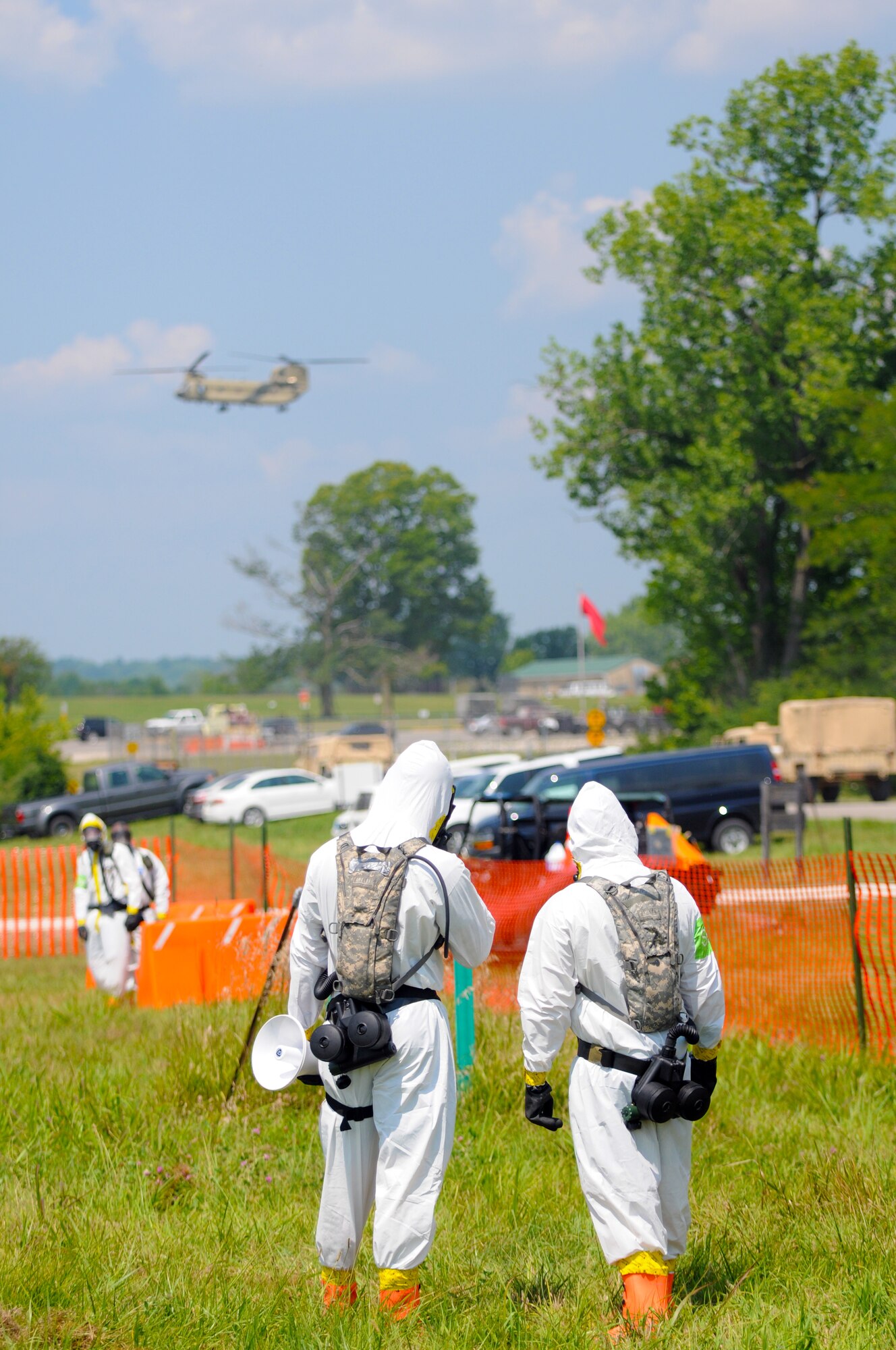 U.S. Air Force Airmen and U.S. Soldiers stand ready to help disaster victims during exercise Vibrant Response July 22, 2014 at Camp Atterbury, Ind. Vibrant Response is a major homeland emergency response exercise conducted by U.S. Northern Command which involves about 5,500 military and civilian personnel from 28 U.S. states and territories. (U.S. Air National Guard photo by Master Sgt. Ralph Branson/Released)