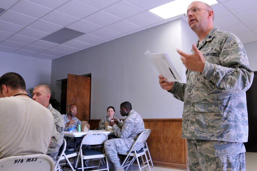 Lt. Col. Christopher Webb, 916th Air Refueling Wing chaplain, talks to 916th ARW maintainers during a R.A.C.K. Attack resiliency event. (USAF photo by SSgt. Terrica Y. Jones, 916ARW/PA)