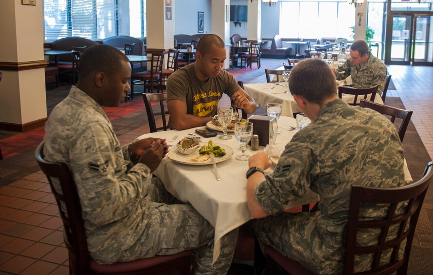 Airmen attend a quarterly birthday meal at the Georgia Pines Dining Facility at Moody Air Force Base, Ga., July 30, 2014. The birthday meals are held quarterly for Airmen who celebrated their birthday during the quarter plus their guests. (U.S. Air Force photo by Senior Airman Jarrod Grammel/Released)

