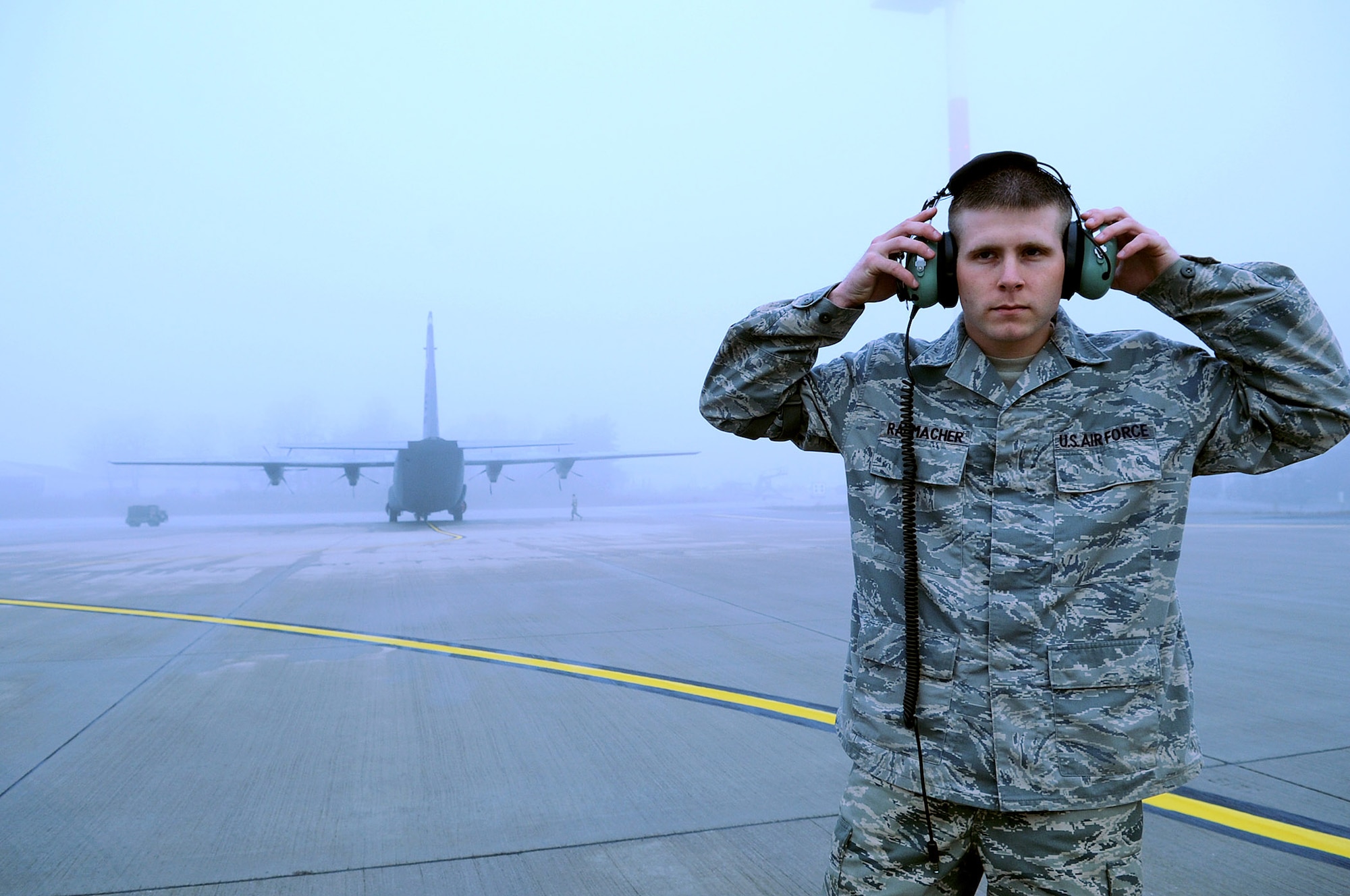 SrA Joseph Rimmacher, 435th Air Mobility Squadron crew chief, ensures his hearing is protected before working on the flight line.
USAF photo by A1C Grovert Fuentes-Contreras
