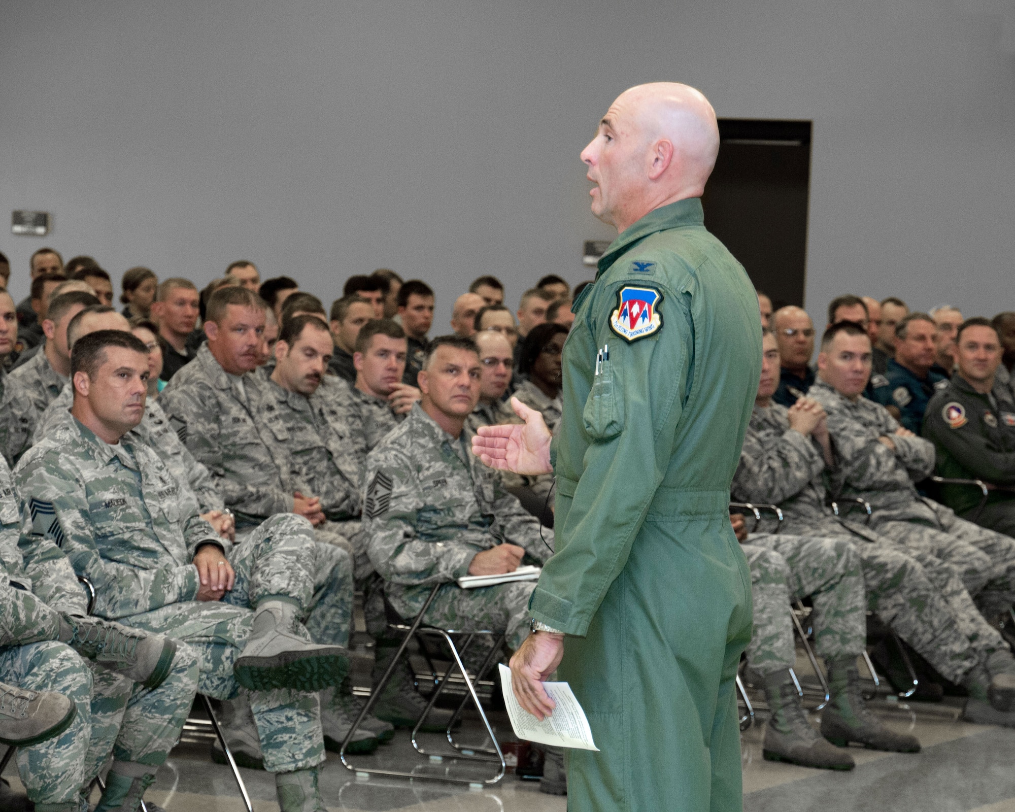 VANCE AIR FORCE BASE, Okla. – Col. Clark Quinn, the 71st Flying Training Wing commander, briefs Vance Airmen July 29 in the Armed Forces Reserve Center during his first wing commander's call since joining Team Vance. Quinn briefed the wing on expectations and requirements. (U.S. Air Force photo/Terry Wasson)