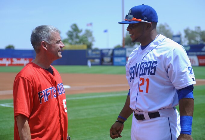 Maj. Gen. Jay Silveria, U.S. Air Force Warfare Center commander, shares a story with Las Vegas 51s right fielder Cesar Puello before the 51s’ game against the Salt Lake Bees at Cashman Field in Las Vegas, Nev., July 27, 2014. Silveria was given the honor of throwing out the game’s ceremonial first pitch. The Las Vegas 51s are the Triple-A affiliate of the New York Mets. (U.S. Air Force photo by Staff Sgt. Siuta B. Ika)