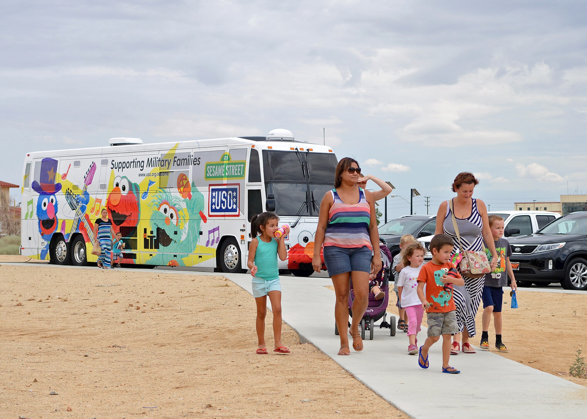 Edwards families arrive at the Oasis Community Center for the "Sesame Street USO Experience for Military Families" show at Edwards Air Force Base, Calif., July 28. (U.S. Air Force photo by Jet Fabara)