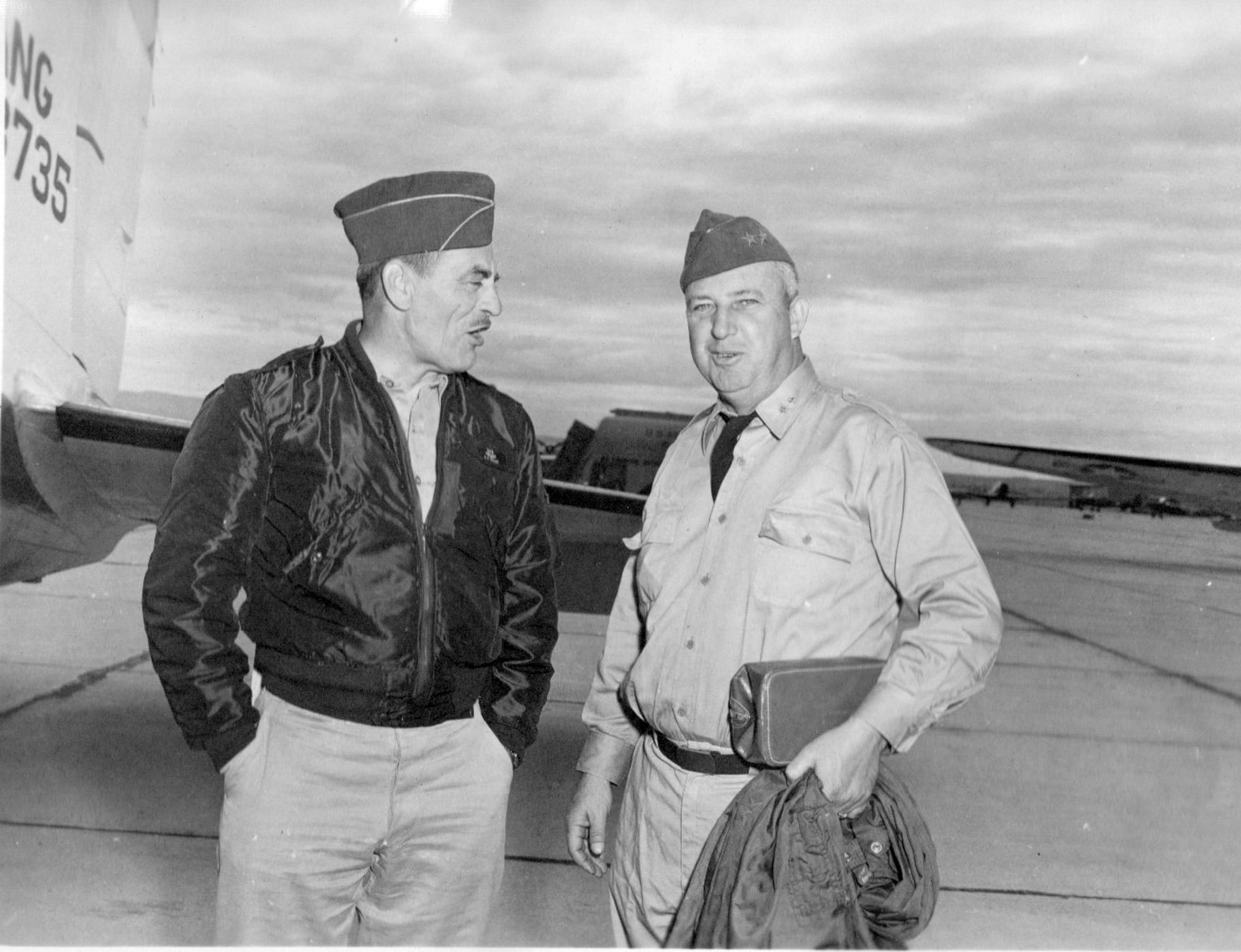 Brig. Gen. G. Robert Dodson, OreANG Commander, chats with an unidentified Major General, probably a visiting Adjutant General from a western state, on the ramp at Gowen Field,  June 15, 1954. (Courtesy 142FW History Archives)