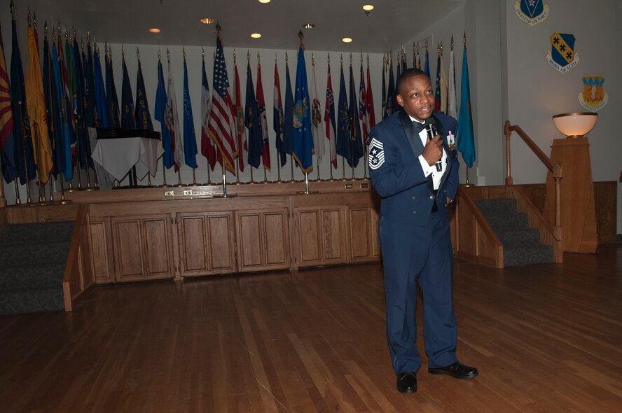 Retired U.S. Air Force Chief Master Sgt. Anthony Brinkley speaks at the Senior Noncommissioned Officers induction ceremony July 18, 2014, at Dyess Air force Base, Texas. Brinkley retired in 2012 as 11th Wing and Joint Base Andrews Command Chief after serving more than 28 years on active duty. Brinkley visited Dyess to mentor 31 of Dyess’ newest senior noncommissioned officer selects and speak at the Senior NCO Induction Ceremony. (U.S. Air Force photo by Airman 1st Class Kylsee Wisseman/Released) 