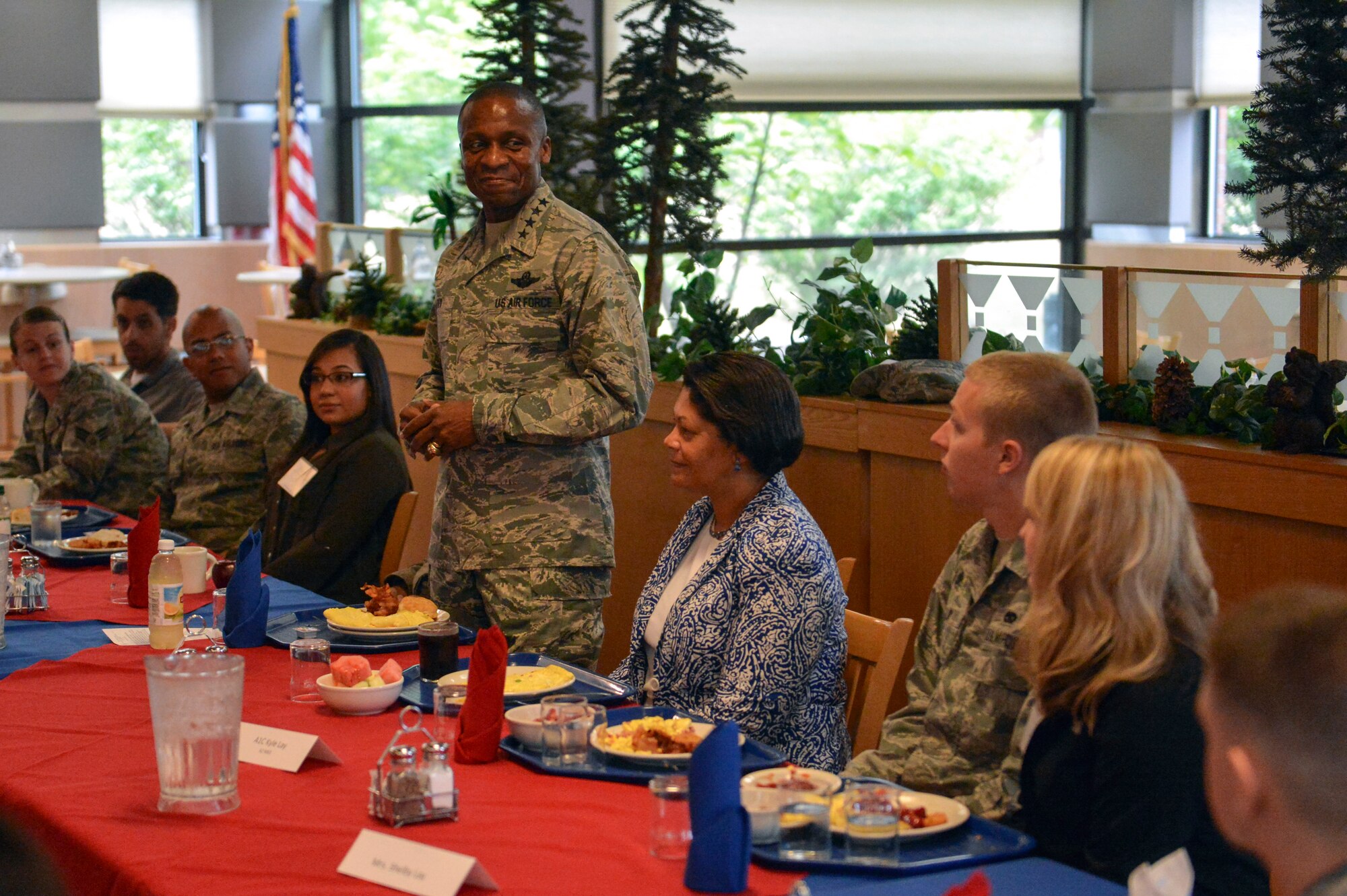 Gen. Darren McDew, Air Mobility Command commander, introduces himself to Airmen and their spouses July 24, 2014, at a breakfast during his and Mrs. Evelyn McDew’s official base visit at Joint Base Lewis-McChord, Wash. The breakfast afforded Gen. and Mrs. McDew time to meet with McChord Airmen and their spouses in a casual setting and answer any questions they had. (U.S. Air Force photo/Staff Sgt. Russ Jackson)