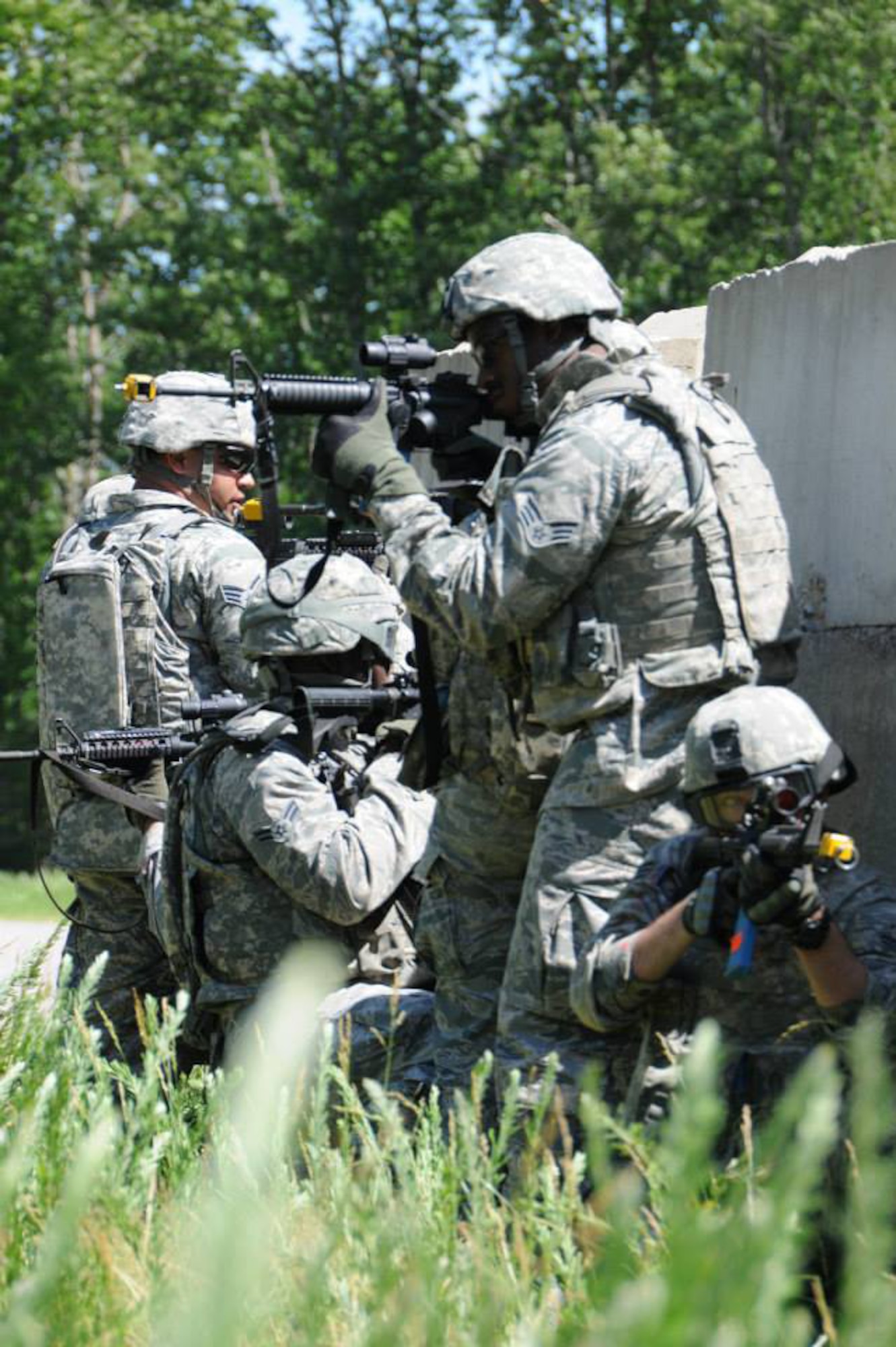 Airmen conduct Urban Operations during Combat Airmen Skills Training at the USAF Expeditionary Center, Joint Base McGuire-Dix-Lakehurst, N.J. CAST is one of the expeditionary combat support programs that remains at the EC after the Phoenix Warrior course was transitioned to Fort Bliss, Texas. 
USAF photo by Brad Camara
