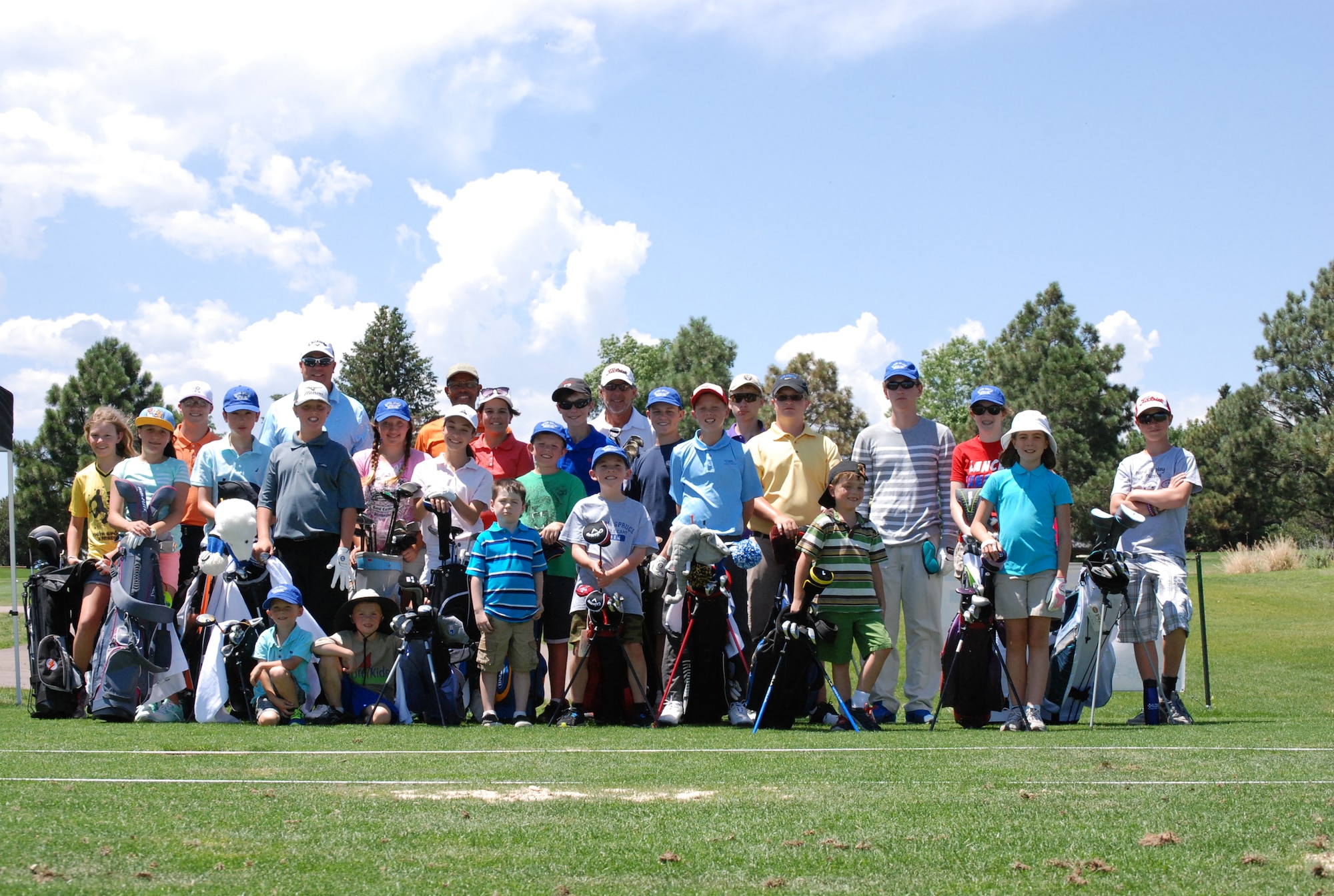 PETERSON AIR FORCE BASE, Colo. — Children of all ages attended the Silver Spruce Golf Academy this summer, where they spent a week on the greens learning the game. Instructors provided guidance and lessons on learning and improving their skills, from advance players with good swings to the very young beginners. (U.S. Air Force photo/Michael Golembesky)