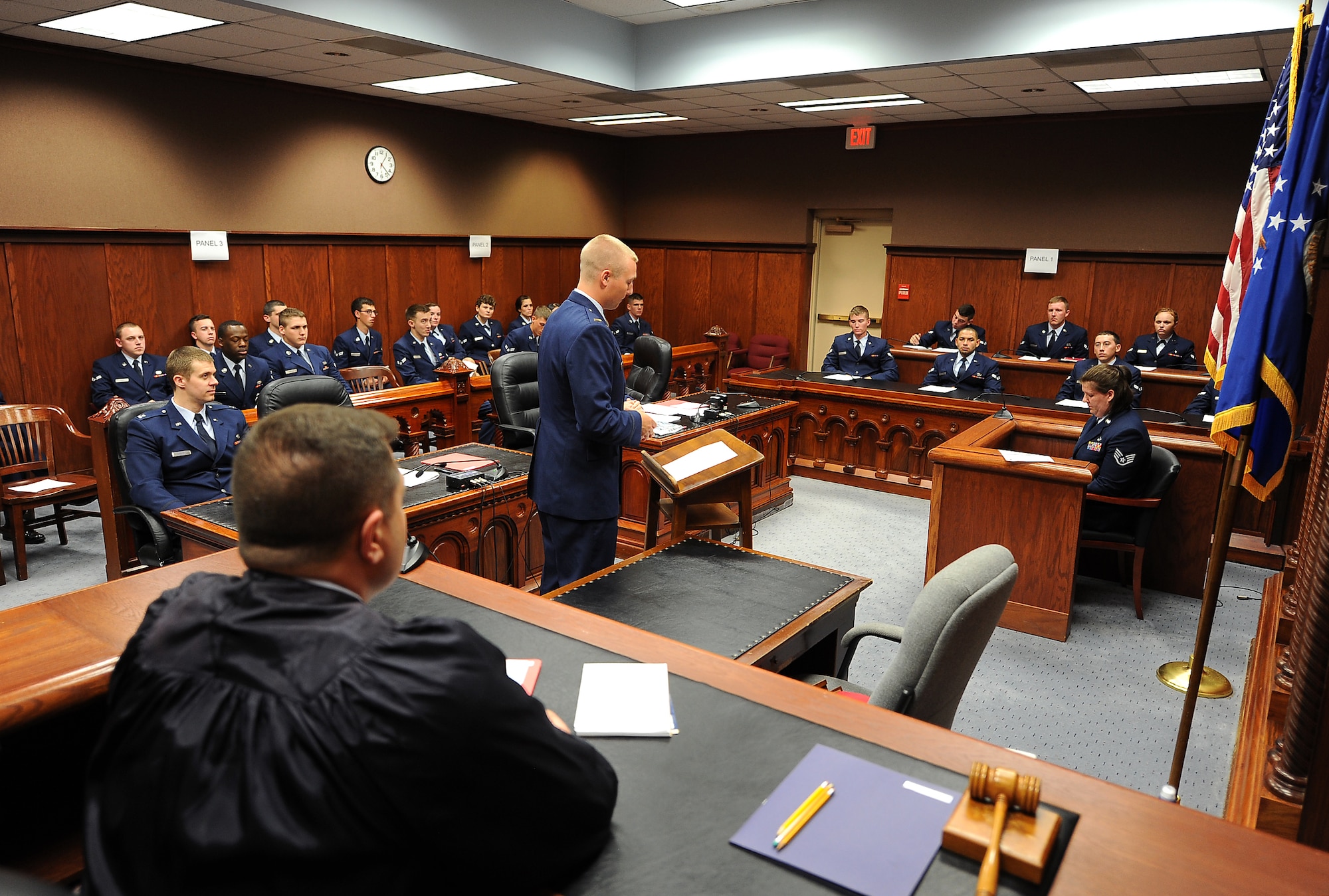 U.S. Air Force 2nd Lt. Ryan Crnkovich, 55th Wing legal intern, cross examines a simulated victim of sexual assault while acting as the defense counsel in a ‘mock trial’ held July 10 inside the Offutt AFB court room. All Airmen attending the week-long First Term Airmen’s Center orientation course will participate in a ‘mock trial’ as part of their training. The 55th Wing legal office created the program with the goal of preventing sexual assault through education and awareness.  (U. S. Air Force photo/Delanie Stafford)