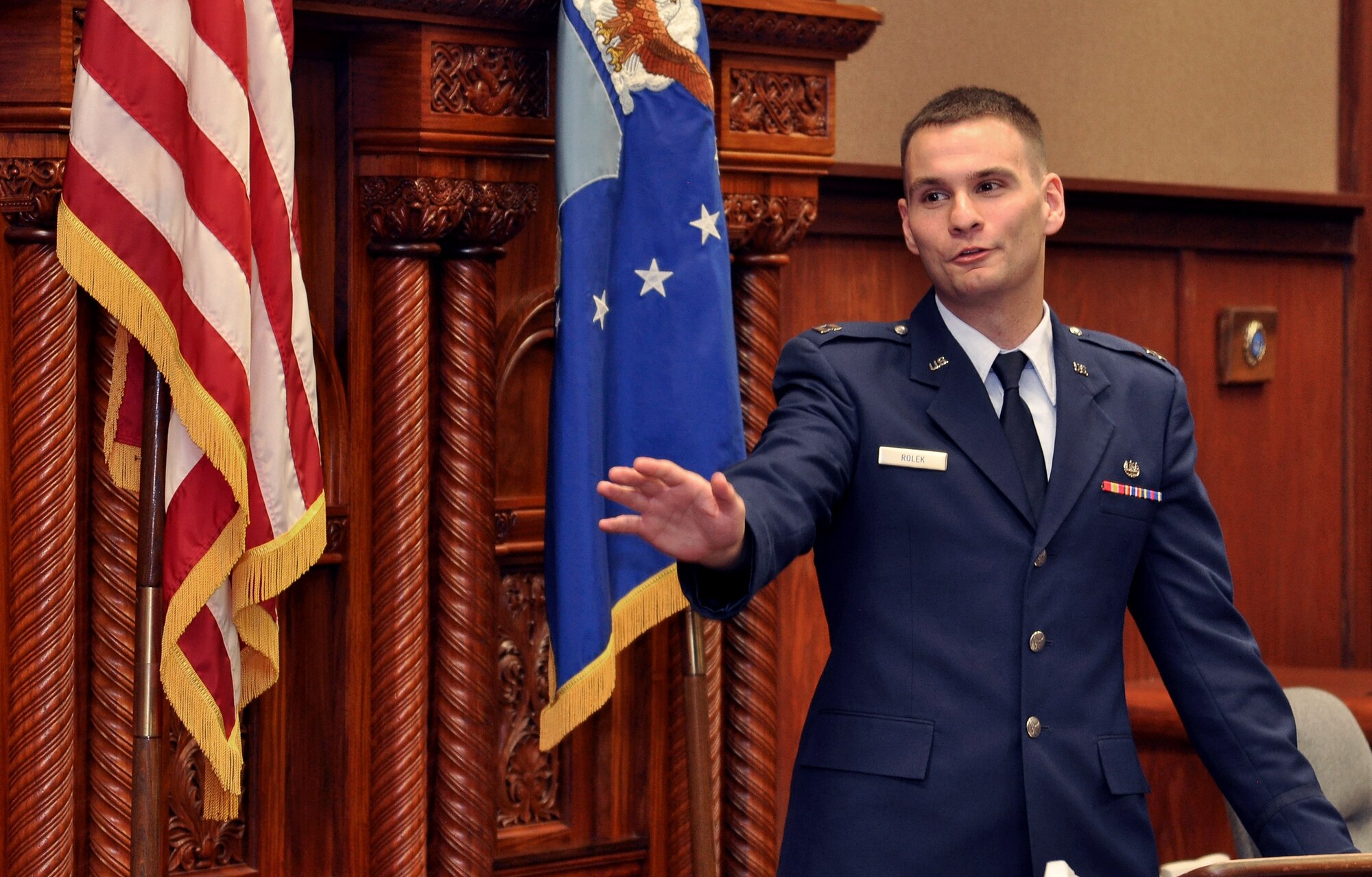 U. S. Air Force Capt. Dave Rolek, 55th Wing assistant staff judge advocate, cross examines a simulated defendant charged with sexual assault during the first ever ‘mock trial’ held June 9 inside the Offutt AFB court room. All Airmen attending the week-long First Term Airmen’s Center orientation course will participate in a mock trial as part of their training. The 55th Wing legal office created the program with the goal of preventing sexual assault through education and awareness.  (U. S. Air Force photo/Delanie Stafford)