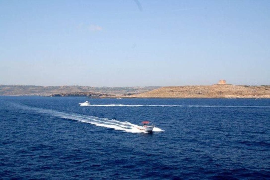 A boat crosses the waters near the island of Comino, which is where the popular Blue Lagoon is located. The Blue Lagoon is a popular day-trip for tourists who wish to escape the bustle of St. Julian’s. It’s also a great destination for snorkelers, divers, windsurfers and photographers. (Courtesy photo)