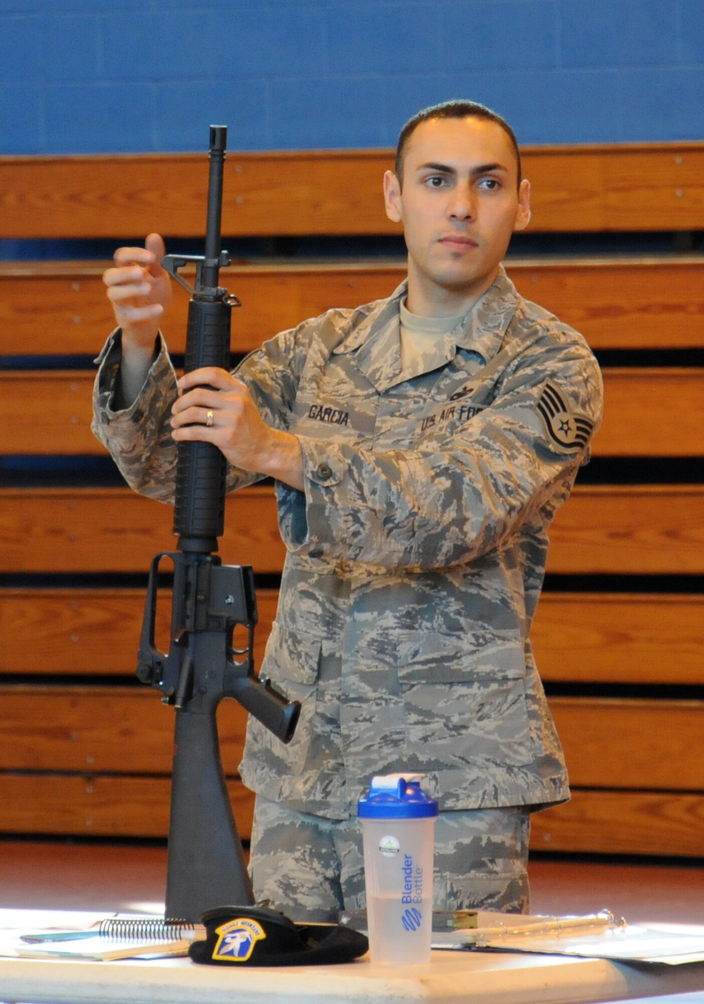 U.S. Air Force Staff Sgt. Joshua Garcia, 100th Security Forces Squadron NCO in charge of the armory from El Paso, Texas, demonstrates how to build and operate a weapon during M16A2 familiarization training July 24, 2014, on RAF Mildenhall, England. Garcia taught Team Mildenhall members how to safely operate a weapon during training to keep Airmen proficient in their skills. (U.S. Air Force photo/Gina Randall/Released)