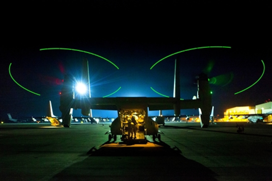 U.S. Marines inspect an MV-22B Osprey before it departs Naval Air Station Sigonella, Italy, July 26, 2014, to assist with the drawdown of personnel from the U.S. Embassy in Tripoli, Libya. The U.S. State Department, in coordination with the U.S. Ambassador for Libya, requested U.S. Defense Department support for a military-assisted departure of personnel from the embassy to Tunisia. The Ospreys are assigned to Special-Purpose Marine Air-Ground Task Force Crisis Response. 