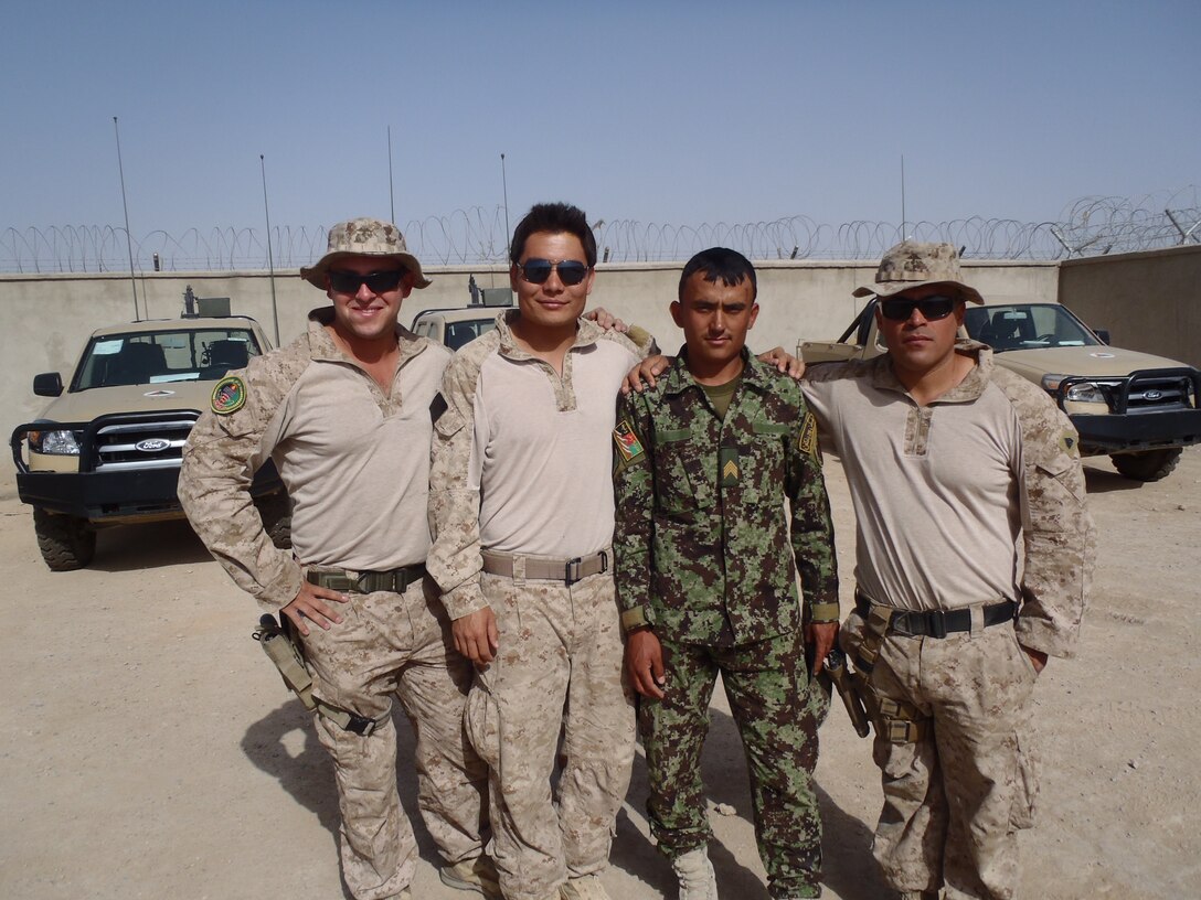 Sergeant Levi J. Slife (far left), a joint terminal air controller, poses with fellow U.S. Marines and a soldier with the Afghanistan Arm at Afghanistan 2012. The JTAC is the chief designator of artillery or close-air support ordinance and has the final say with the pilot or gunner before they commit to the attack. Slife is with Company I, Battalion Landing Team 3rd Bn., 5th Marines, 31st Marine Expeditionary Unit, and a native of Littleton, Colorado. (Courtesy photo provided by Sgt. Levi J. Slife during his third tour in Afghanistan.) 