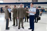 Polish Army Gen. Mieczyslaw Cieniuch (center), Chief of the General Staff of the Polish Armed Forces, is escorted on a tour of 162nd Fighter Wing aircraft maintenance facilities by Air Force Col. Jim Taylor, 162nd Maintenance Group commander. (U.S. Air Force photo by Master Sgt. Dave Neve)