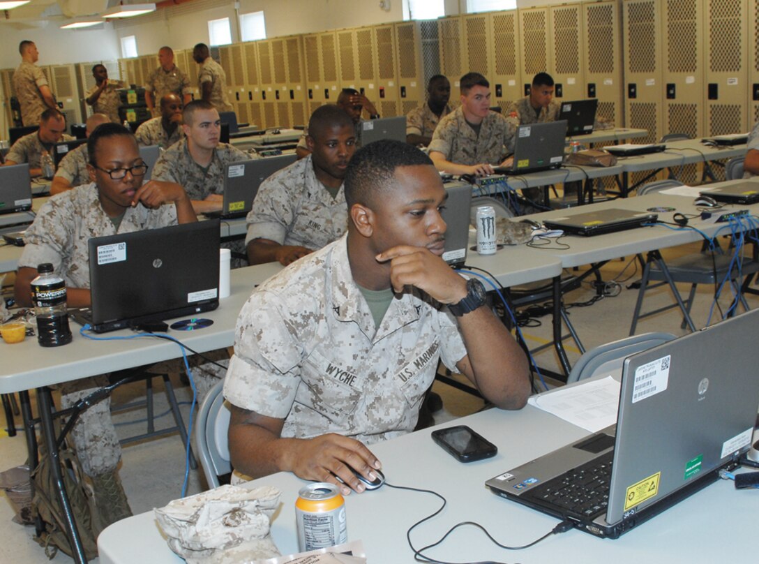 Marine reservists familiarize themselves with the Global Combat Support System-Marine Corps, July 24, during their annual training at Marine Corps Logistics Base Albany, Georgia. The GCSS-MC is a system that ensures proper logistical receipt, disbursement and tracking of equipment.