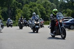 Students, including Chief Warrant Officer 3 Thomas Anspach, North Carolina National Guard assistant state training officer, ride during the Highway Patrol's Bike Safe assessor's course on July 18, 2014, in Raleigh N.C. Ansbach is the first National Guardsman to graduate from this course. 