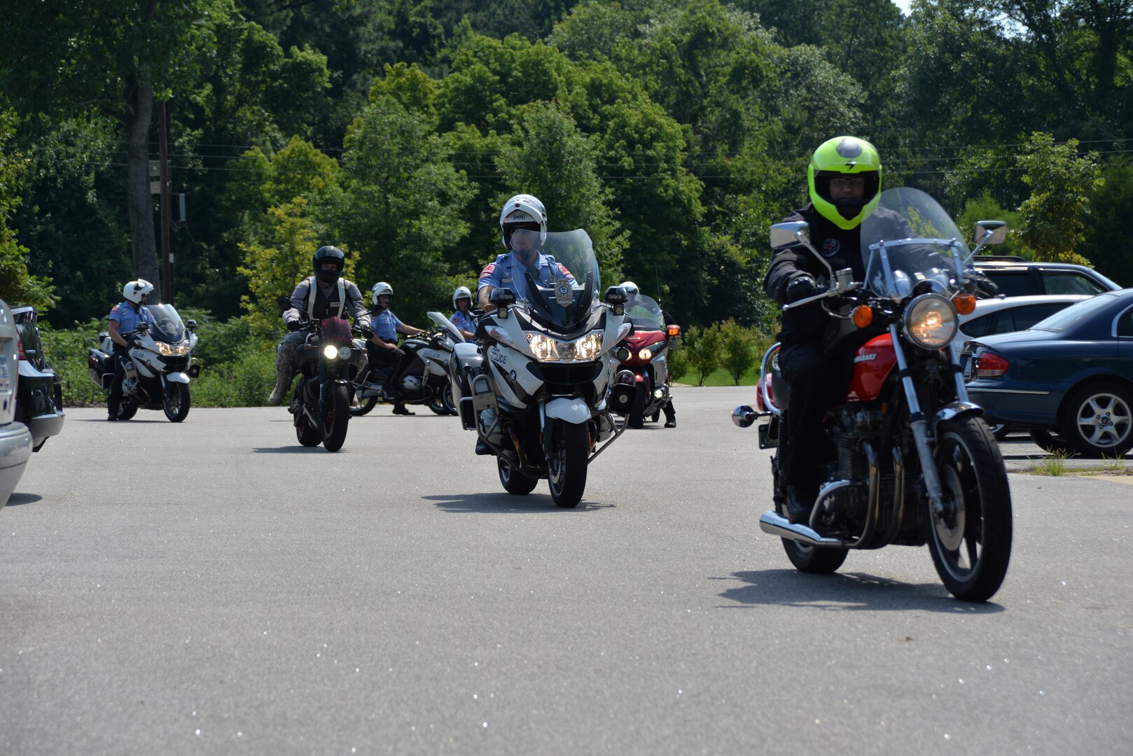 Students, including Chief Warrant Officer 3 Thomas Anspach, North Carolina National Guard assistant state training officer, ride during the Highway Patrol's Bike Safe assessor's course on July 18, 2014, in Raleigh N.C. Ansbach is the first National Guardsman to graduate from this course. 