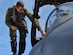 Capt. Patrick Hickie III prepares to enter an aircraft during a mission July 16, 2014, at Joint Base Pearl Harbor-Hickam, Hawaii. The 391st Fighter Squadron is currently on a two-month deployment here from Mountain Home Air Force Base, Idaho. While here, the squadron’s F-15E Strike Eagles have participated in Rim of the Pacific 2014 exercise missions. RIMPAC is a U.S. Pacific Command-hosted biennial multinational maritime exercise designed to foster and sustain international cooperation on the security of the world’s oceans. Hickie is a 391st FS F-15E weapon systems officer. (U.S. Air Force photo/Staff Sgt. Alexander Martinez)