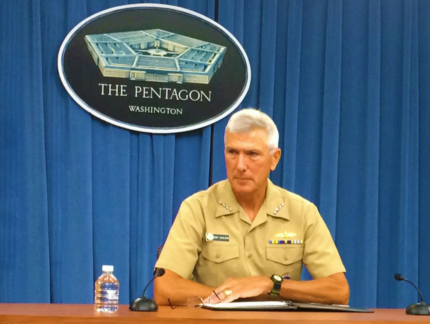 WASHINGTON (July 29, 2014) - Navy Adm. Samuel J. Locklear III, commander of U.S. Pacific Command, listens to a reporter’s question during a news conference at the Pentagon.     