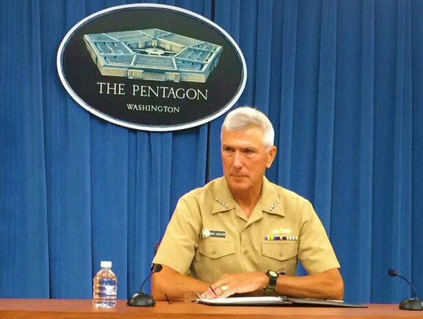 WASHINGTON (July 29, 2014) - Navy Adm. Samuel J. Locklear III, commander of U.S. Pacific Command, listens to a reporter’s question during a news conference at the Pentagon.     