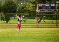 The 8th Maintenance Squadron Dragons play the 8th Civil Engineer Squadron Red Devils during the squadron championship softball game at Kunsan Air Base, Republic of Korea, July 30, 2014. The game’s final score ended with the Dragons taking the win, 14 to 9. (U.S. Air Force photo by Staff Sgt. Jose Rodriguez/Released)