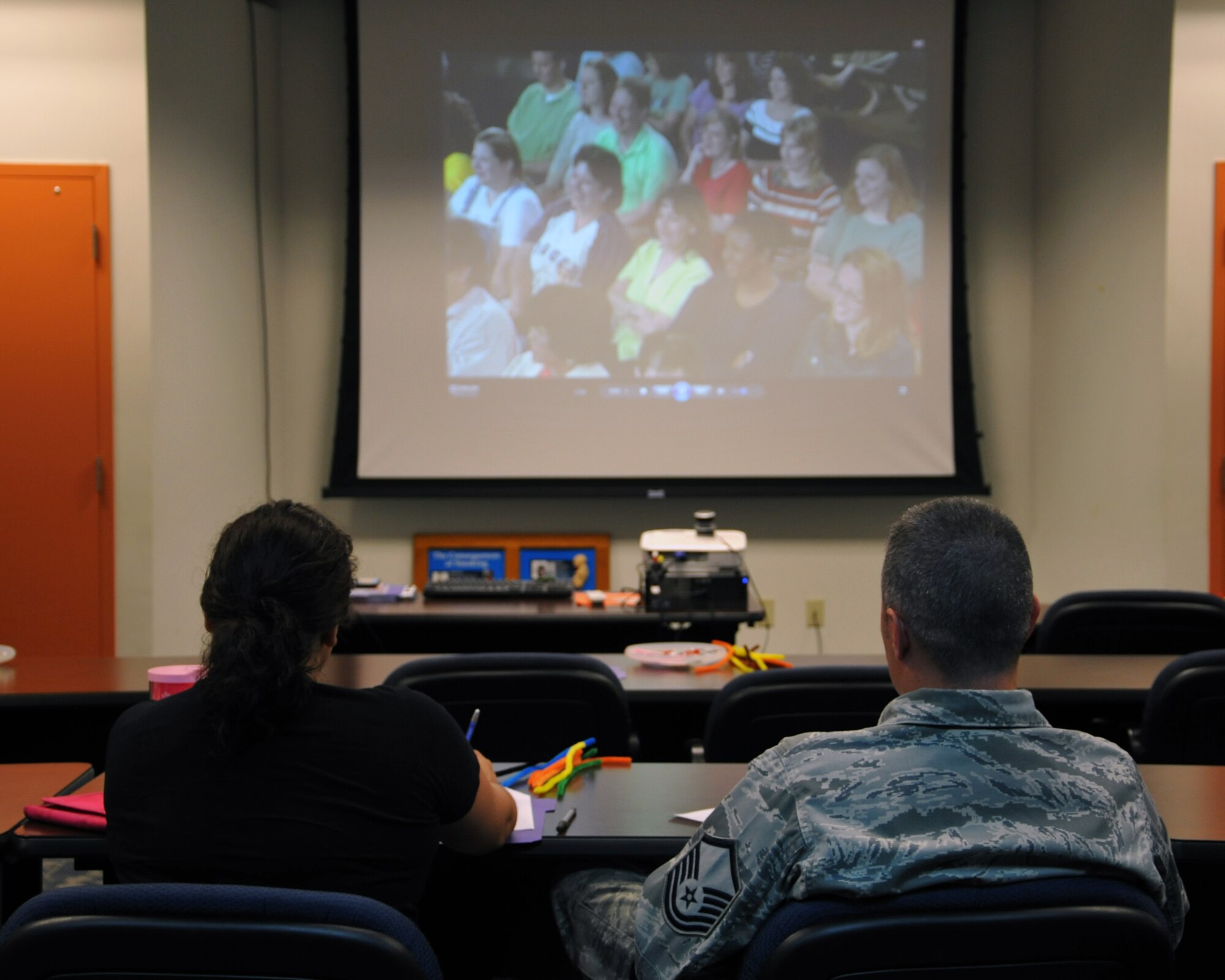 Parents attend the 1-2-3 Magic class held at the 36th Medical Operations Squadron Health and Wellness Center July 23, 2014, on Andersen Air Force Base, Guam. The bimonthly class aims to help parents learn how to use the 1-2-3 counting method when disciplining their children. (U.S. Air Force photo by Senior Airman Cierra Presentado/Released)