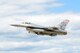 An F-16 Fighting Falcon from the 115th Fighter Wing in Madison, Wis., flies above Volk Field Air National Guard Base, Wis., July 16, 2014. The jets were moved to Volk Field for the month of July to complete mission training, while the Dane County Regional Airport completed runway maintenance and repairs. (Air National Guard photo by Senior Airman Andrea F. Liechti)