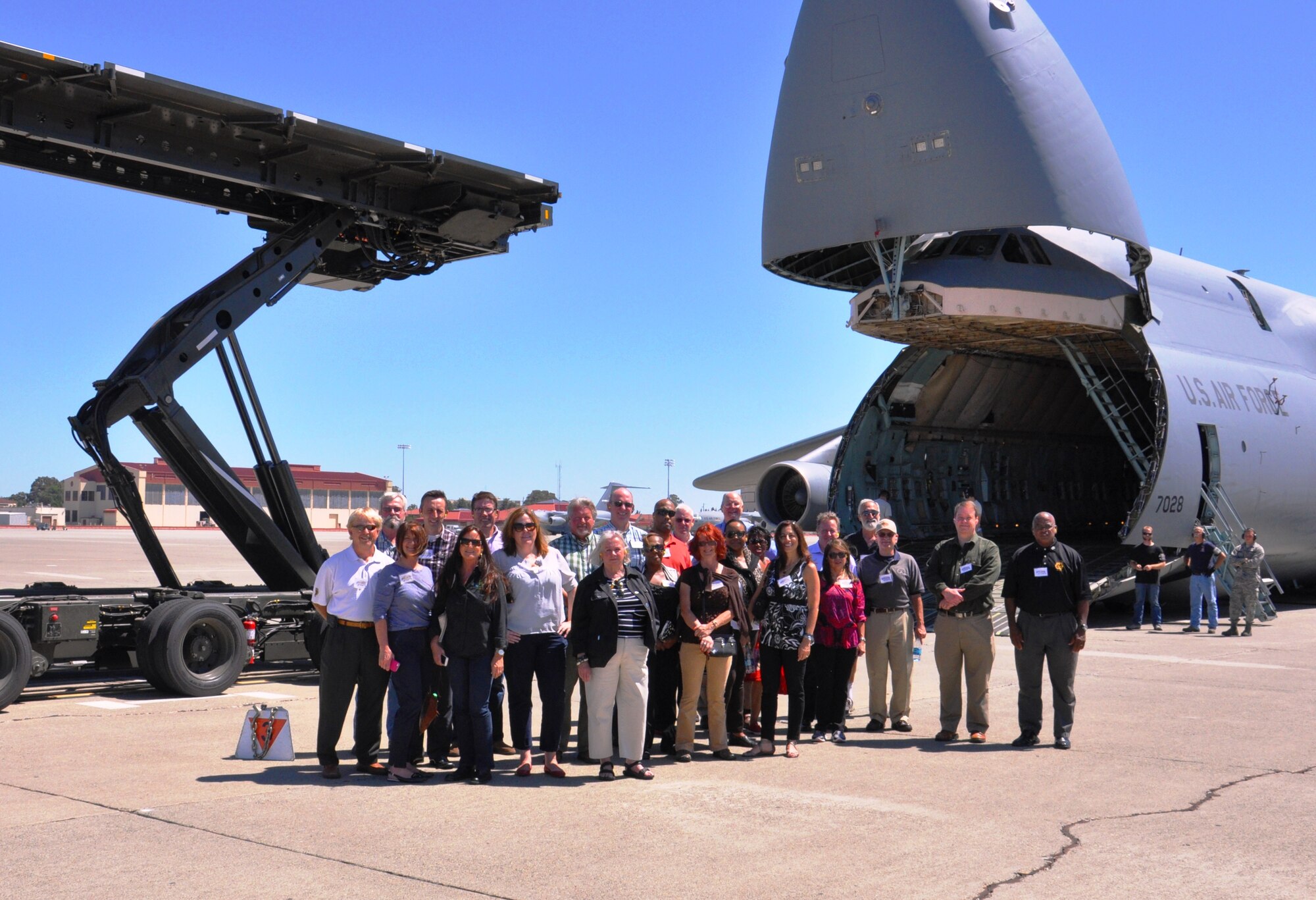 Travis honorary commanders wrap up a tour of the C-5 Galaxy during the 60th Maintenance Group tour July 25. The tour consisted of visiting several different maintenance shops to showcase the Airmen and Air Force capabilities to civic leaders throughout the community. (U.S. Air Force photo/Senior Airman Bryan Swink)